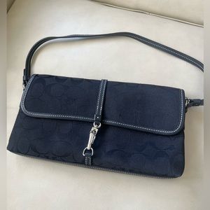 Coach hand bag black and silver.